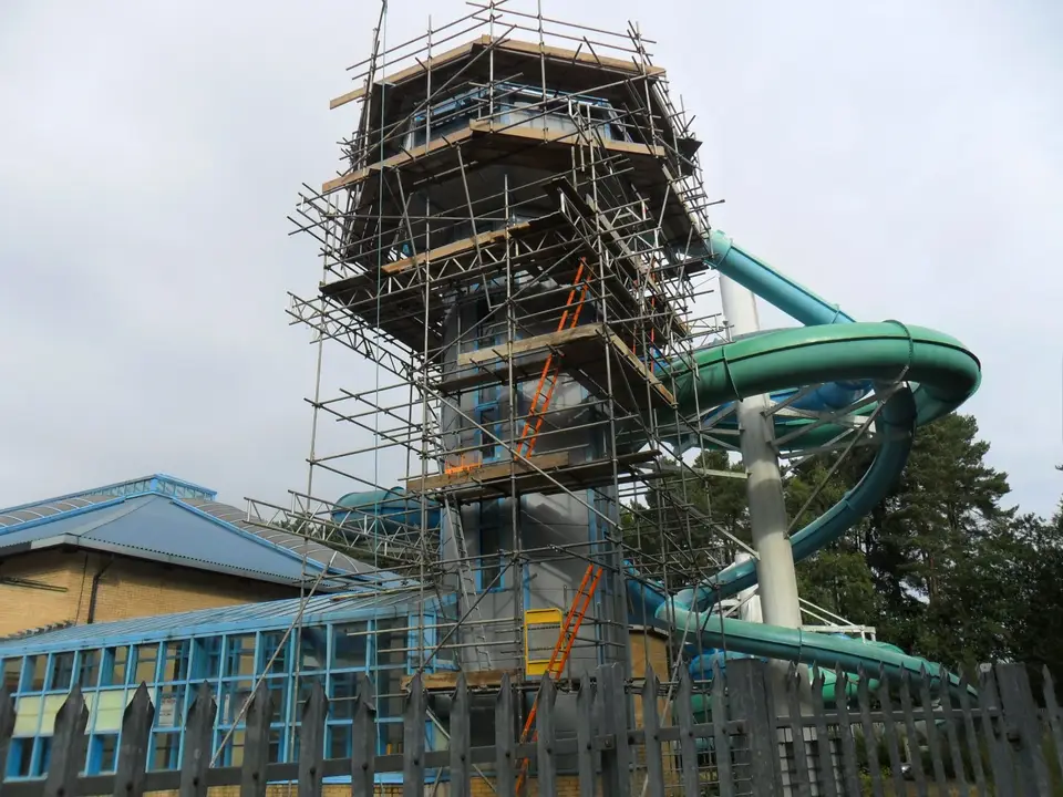 Scaffold built around the flume tower at Coral Reef Waterworld in Bracknell for repairs