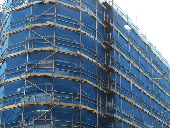 Upper lifts of a fully netted scaffold on a Maidenhead office block