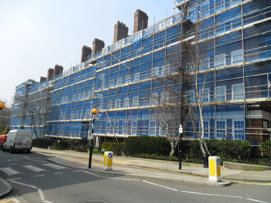 Scaffolding along blocks of flats in Kings Cross, London for window replacement