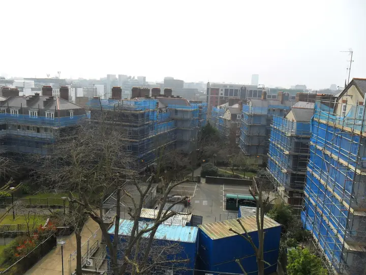 Blue-netted scaffolding on residential blocks in Kings Cross